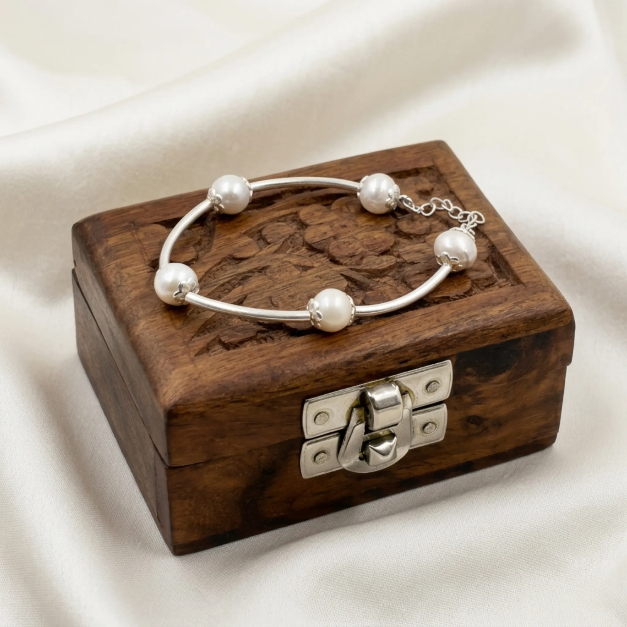 SIZE GUIDE — bracelet and ring on wrist, soft daylight
