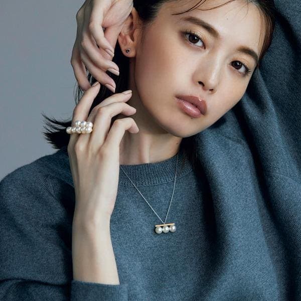 Akoya pearl pendant styled with modern workwear