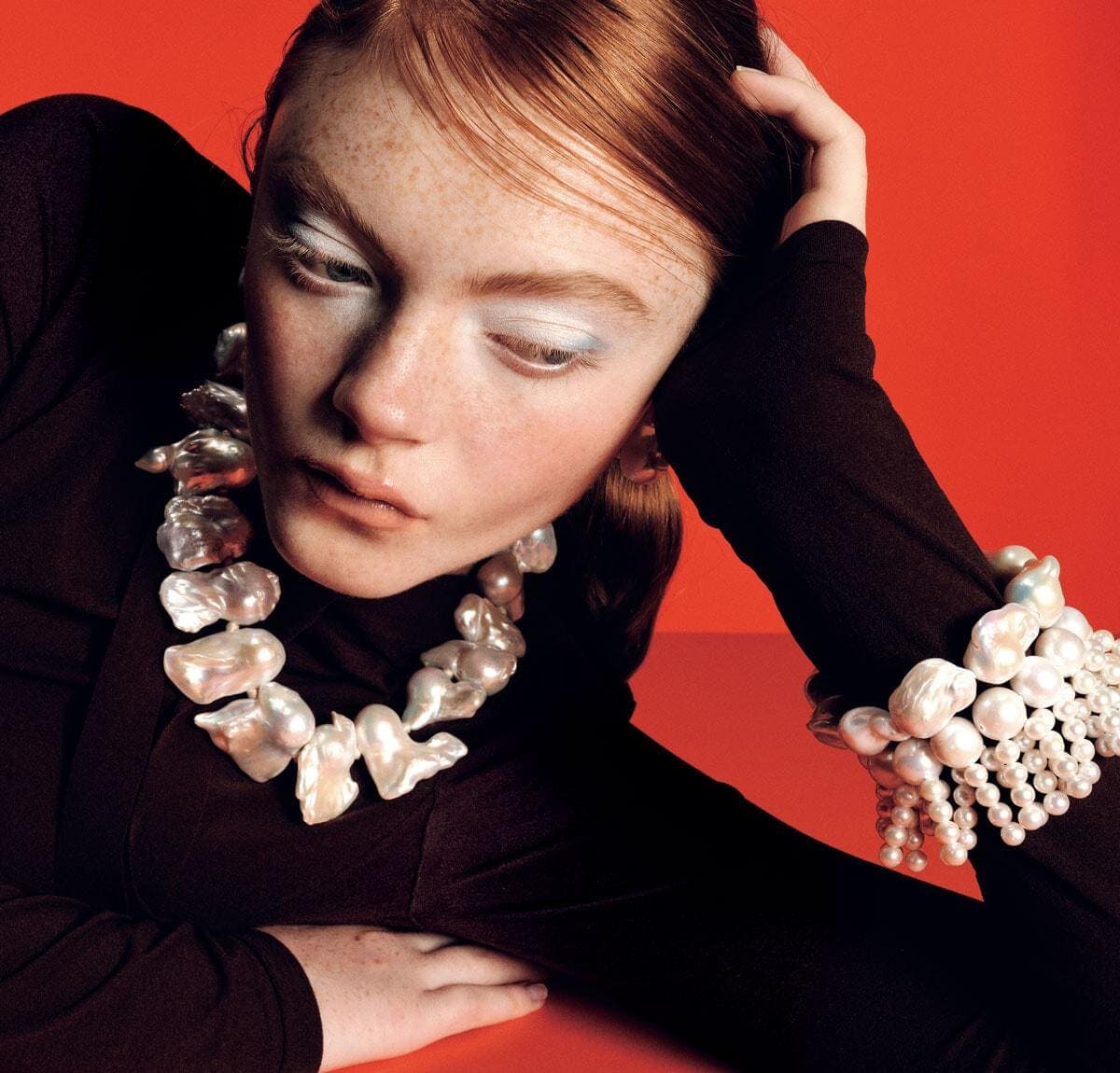 Editorial portrait with layered baroque pearl jewellery
