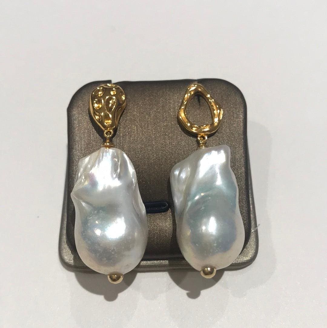 A pair of sculptural baroque pearl earrings