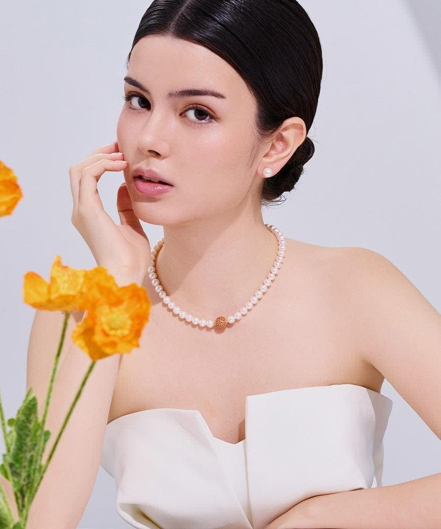 Freshwater pearl necklace styled with a white outfit