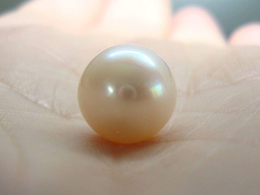 A near round pearl with subtle natural variation